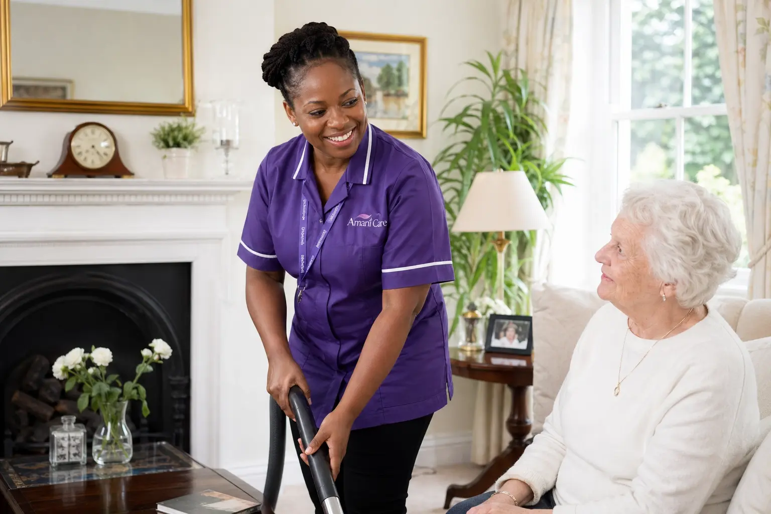 An Amani Care carer helping a client at home